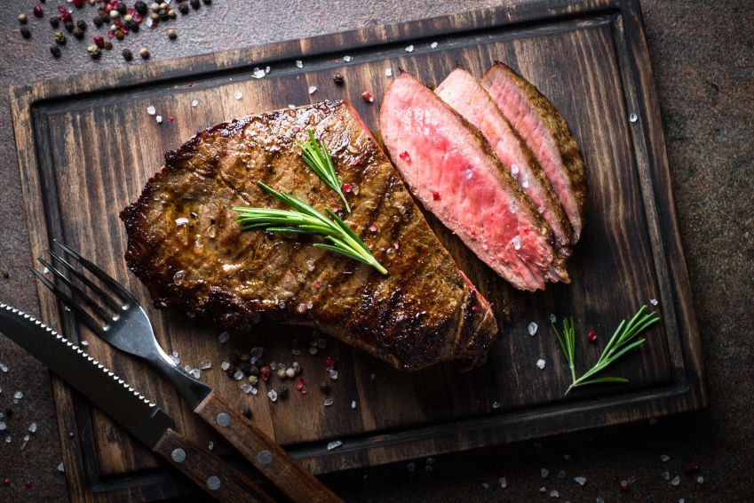 *roasted garlic and rosemary grilled beef tenderloin with a port wine demi glaze