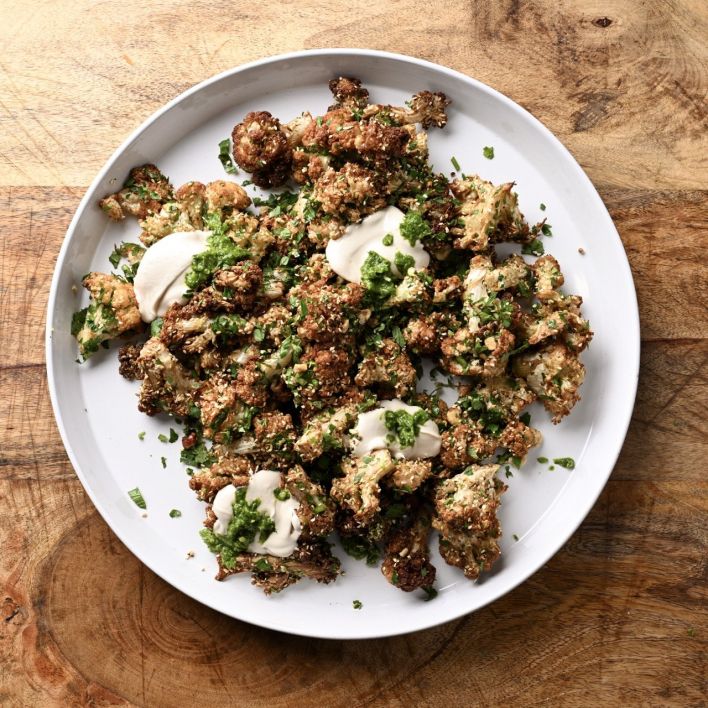 Fried cauliflower, white tahini, almonds, hazelnut dukkah, zhoug