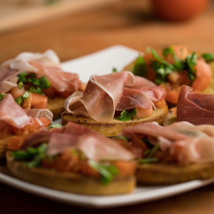 prosciutto crostini: fig jam and goat cheese